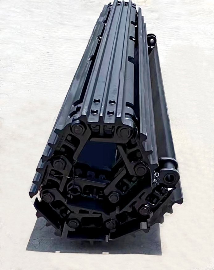 Track chain assembly coiled for packing