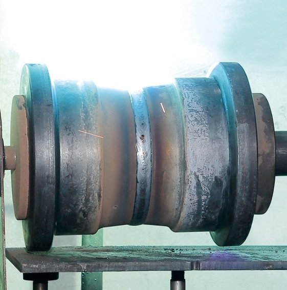 Track roller shell and bushing detail